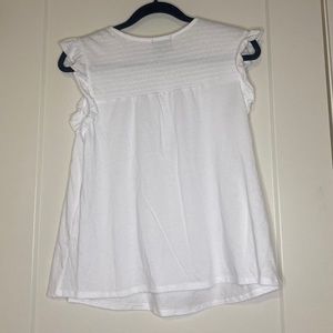 White ruffle sleeveless top